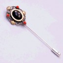 Aguja plata oro azabache