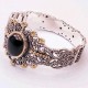 Pulsera plata, oro y azabache