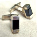 Gemelos plata y azabache