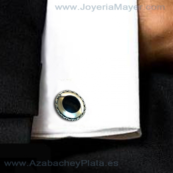Gemelos azabache y plata