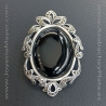 Silver and jet brooch