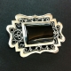 Silver and jet brooch