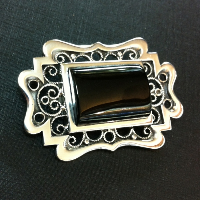 Silver and jet brooch